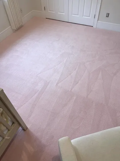 Pale pink plush carpet installed in a bedroom