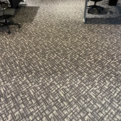 Patterned commercial carpet tile installed in an office